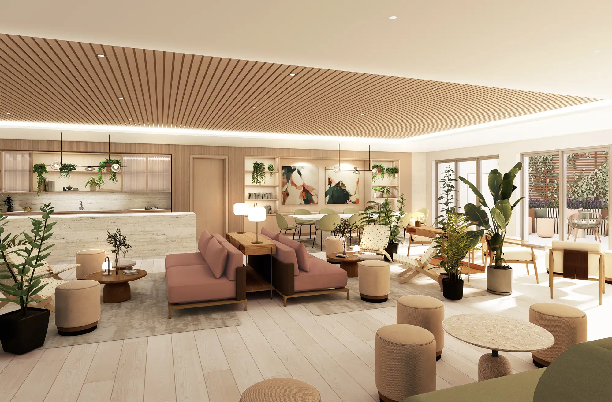 A modern room with a pink sofa, round stools, various indoor plants, and a kitchen area in the background, featuring a contemporary and open-concept design.